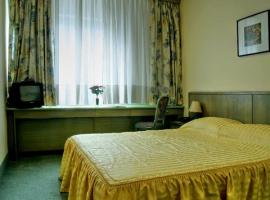 Bedroom in the centrally located Zagreb Comfort Hotel