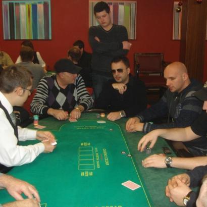 Men playing cards in casino