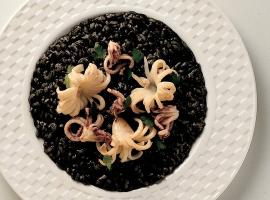 Try black risotto with sea food